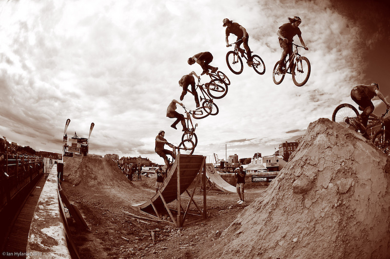 Eric Lawrenuk sticking the downside 360 whip on his second attempt. Back on the bike with time to do another trick if he d wanted to...