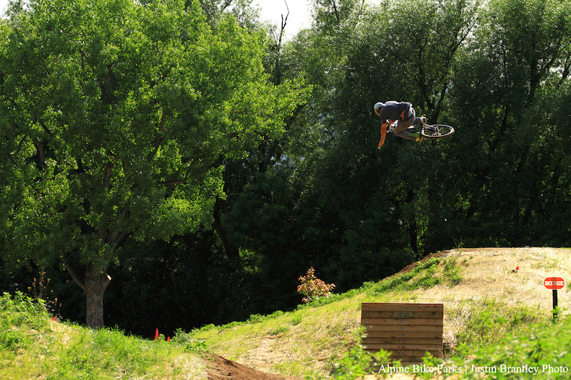 Opening day at Valmont Bike Park Here Cob aws the crowd with a nicely boosted table 