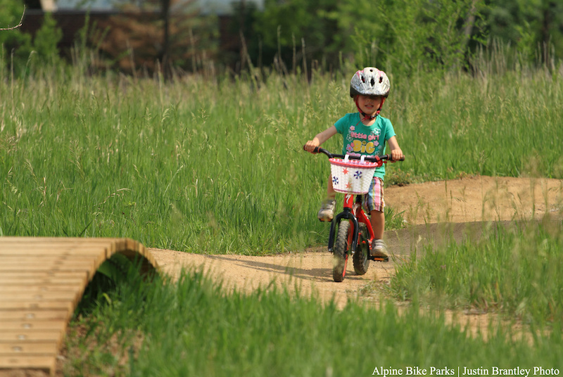 This little girl is stoked to be riding 
