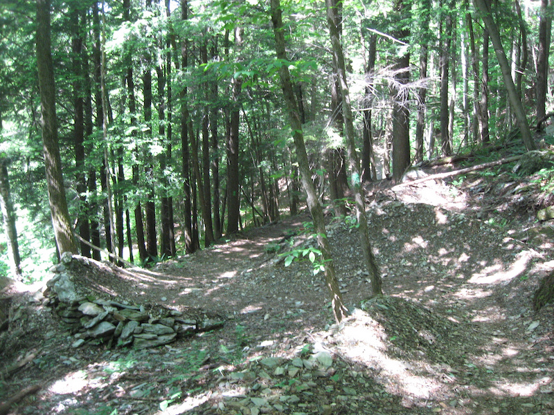 S-Berms on The Stairs. Enter on right side left berm to right berm. Sort of hard to see in the photo.