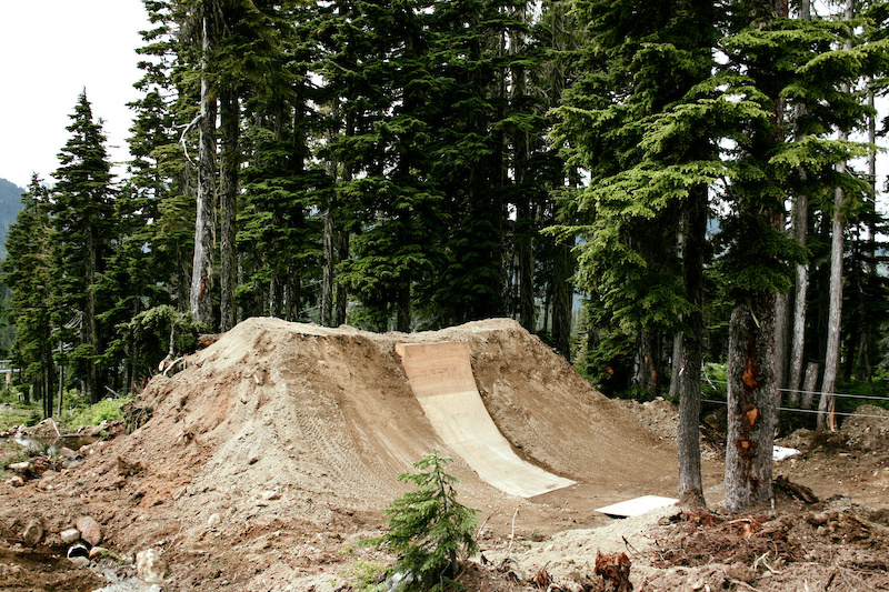 The final feature a monster dirt quarter pipe tombstone with wood ramp that is currently getting tweaked by Claw and crew.