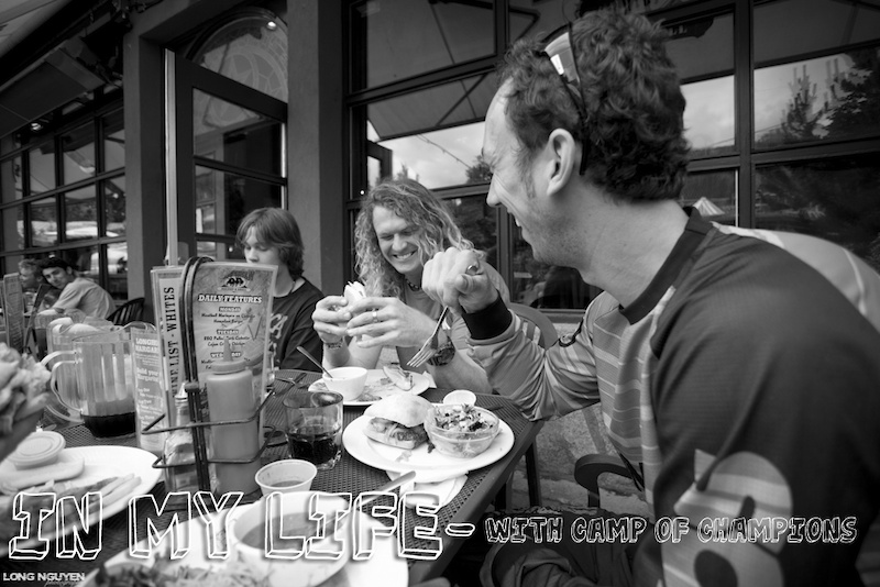 Coaches Eric Porter and Kelly Mcgarry eating lunch with the campers.