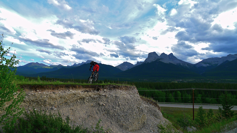 Striving for mediocrity. Piloting the Ellsworth over the washout gap in Canmore. Story at http mtnmanjake.pinkbike.com blog Striving-for-Mediocrity.html