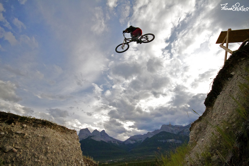 Striving for mediocrity. Piloting the Ellsworth over the washout gap in Canmore. Story at http mtnmanjake.pinkbike.com blog Striving-for-Mediocrity.html