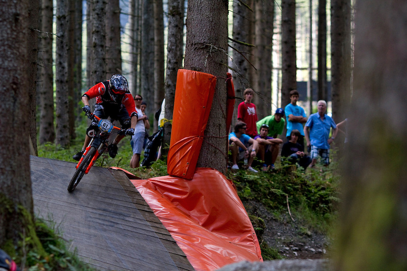 screaming spectators pushed the riders down the track well some of them were screaming...