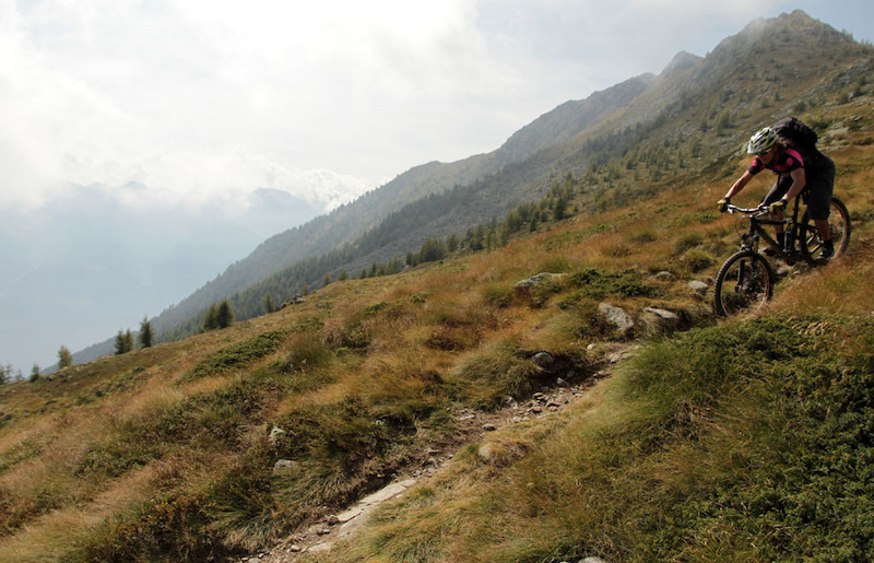 Crossing the Swiss-Italian border and starting the 2000m descent of Col D Anzana