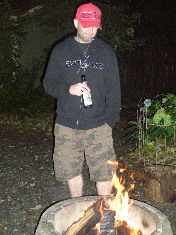 backyard fire pit beer in hand life is good.