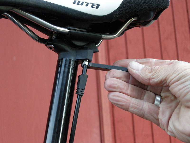 If you are only going to remove one side of the hose unscrew the seatpost end because you won t have to mess with the speed control valve at the remote side.