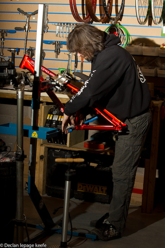 slam man working on the bike