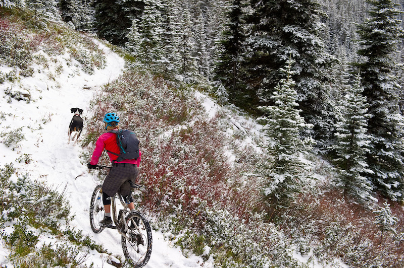 Jenny Konway milking the end of the high country in the Washington Cascades with a ride on Dalles Ridge from Corral Pass to Buck Creek on the Ranger Creek Trail in mid November with Reilly. Note the knee warmers. Jenny s also rocking the Dakine White Knuckle gloves.