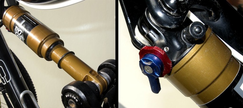 X-Fusion s Microlite shock is dwarfed by the pivot hardware of the Tomac Diplomat 29er. The shock body is slim - almost exactly the diameter of the grip-end of a handlebar. The red dial is a basic low-speed rebound control while the blue lever offers only lockout and open options.