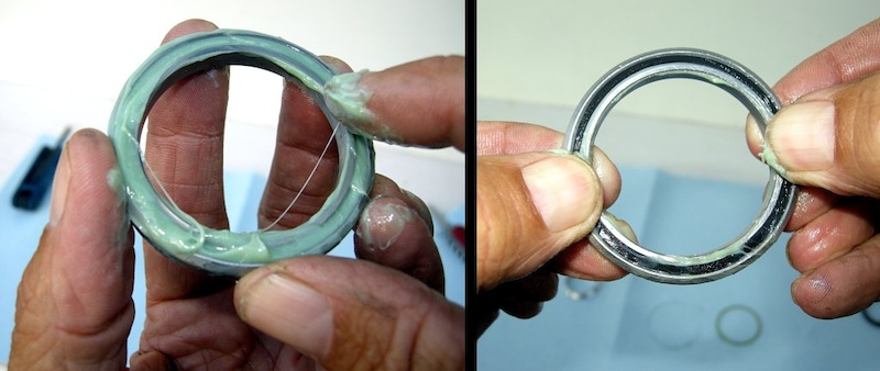 Photo 6 - Dry the bearings and then pack them full of lightweight synthetic grease. Spin the bearing to get the grease around the balls. Wipe the seal clean and then gently snap in back into place with thumb pressure.