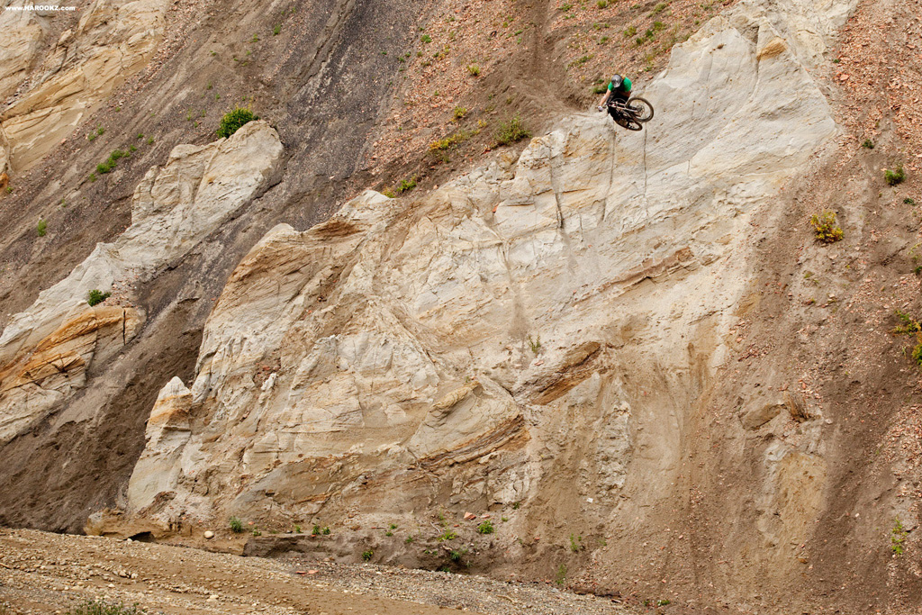 One of the longer descents Kelly McGarry had on deck ended with a vertical wall, perfectly aligned for a step-down. All we had to do was buff in a run in and she was good to go. Nothing beats the usage of natural big mountain terrain. 