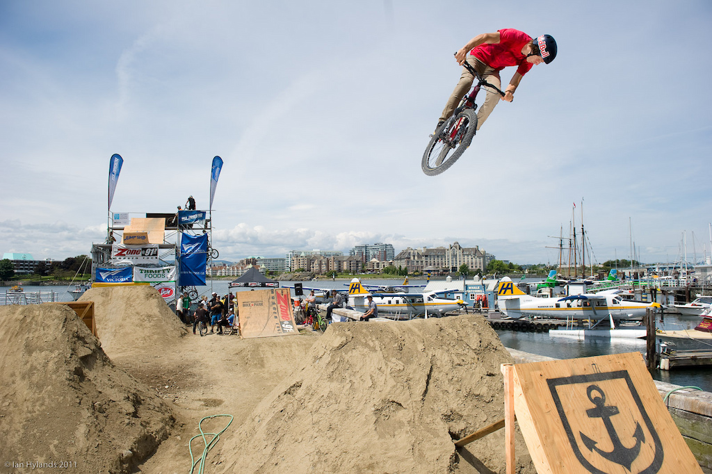 Brandon Semenuk with a huge 360 over the little jump on the back 9 during practice