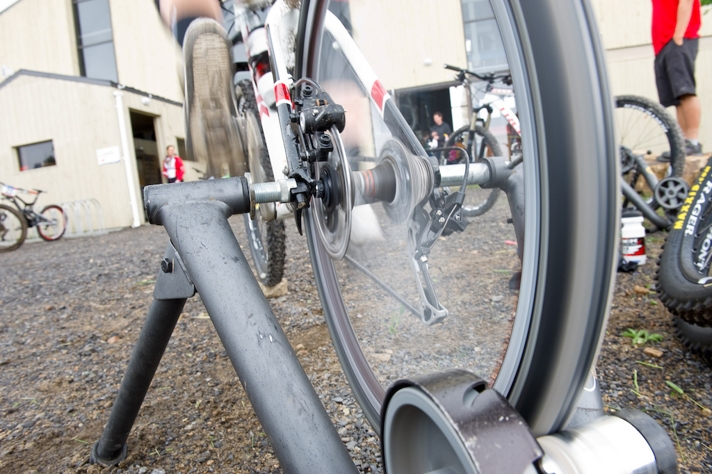 The steady buzz of trainers is the prevalent sound at the start of the DH track before the race. Keep those legs warmed up and the blood flowing there is a lot of pedaling in this race...