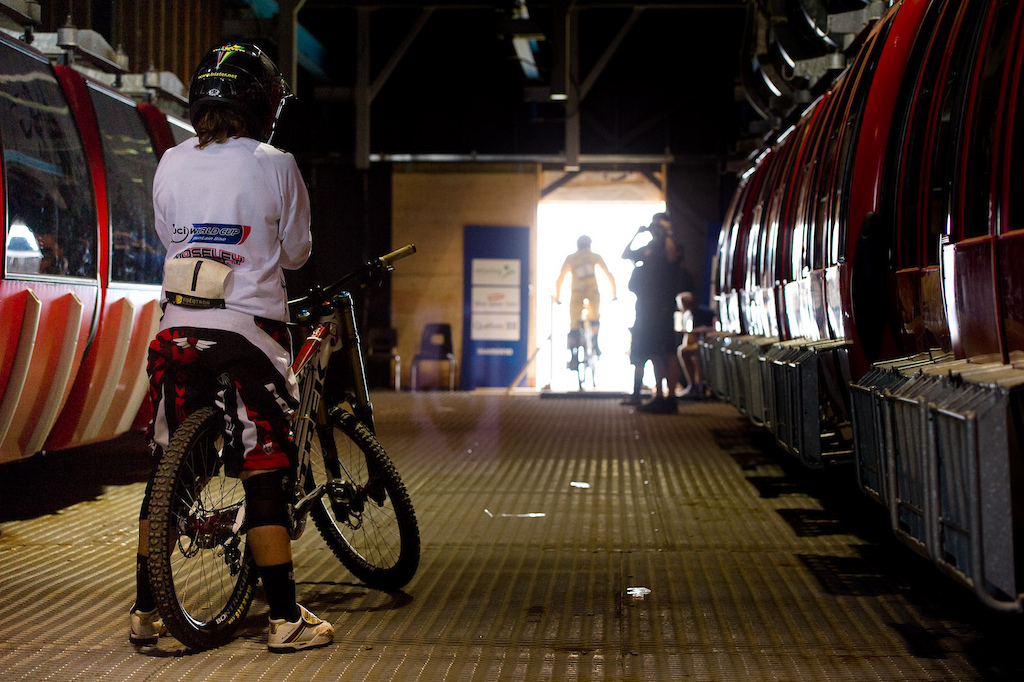A trail of tear offs leads the way to the gate as Tracy Moseley waits for Floriane Pugin to start. Last rider in the start house less than a minute to go before the start of her winning run.