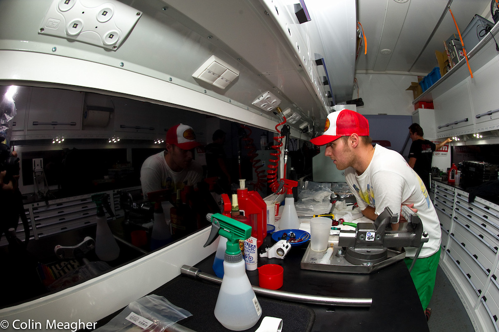 Evan Warner checking out the competition in the pits via the smoked windows on the new SRAM rig.
