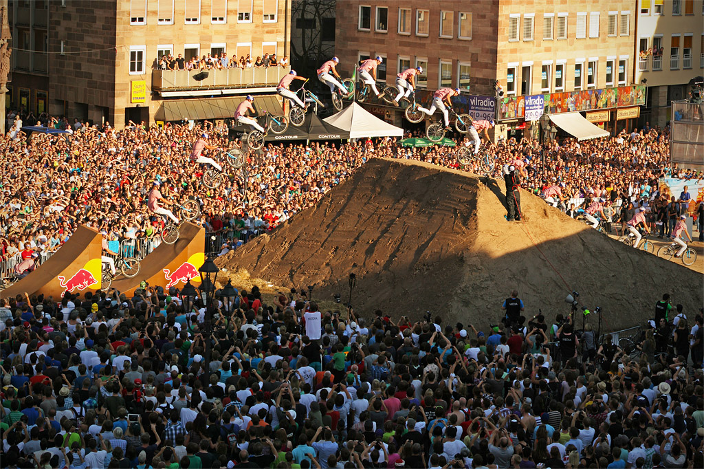 Martin s last jump during the 2011 Red Bull District Ride - barspin to tailwhip into second place congrats photo c by www.larsscharlphoto.com me