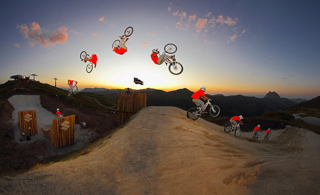 Bienve pulls a huge fronty nohander over the Suzuki Nine Knights MTB jumps during the last minutes of the sundown session... awesome event Re-upload - make sure to watch it in high res Photo c by www.larsscharlphoto.com me