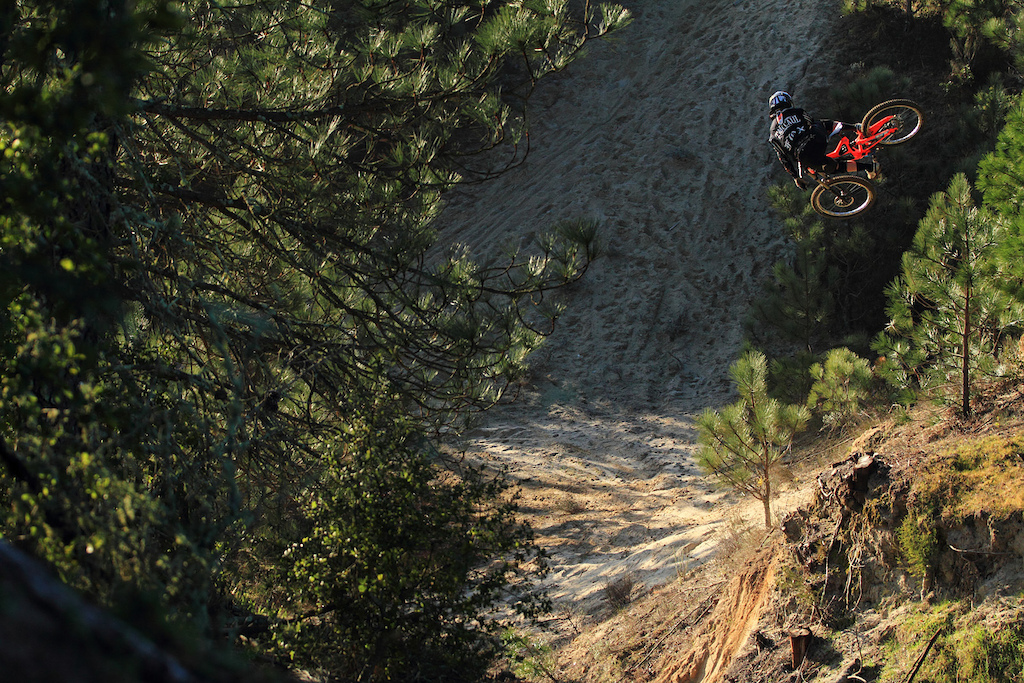 T-Mac clicking a massive whip on his downhill bike for the Fox McCaul bros shoot.