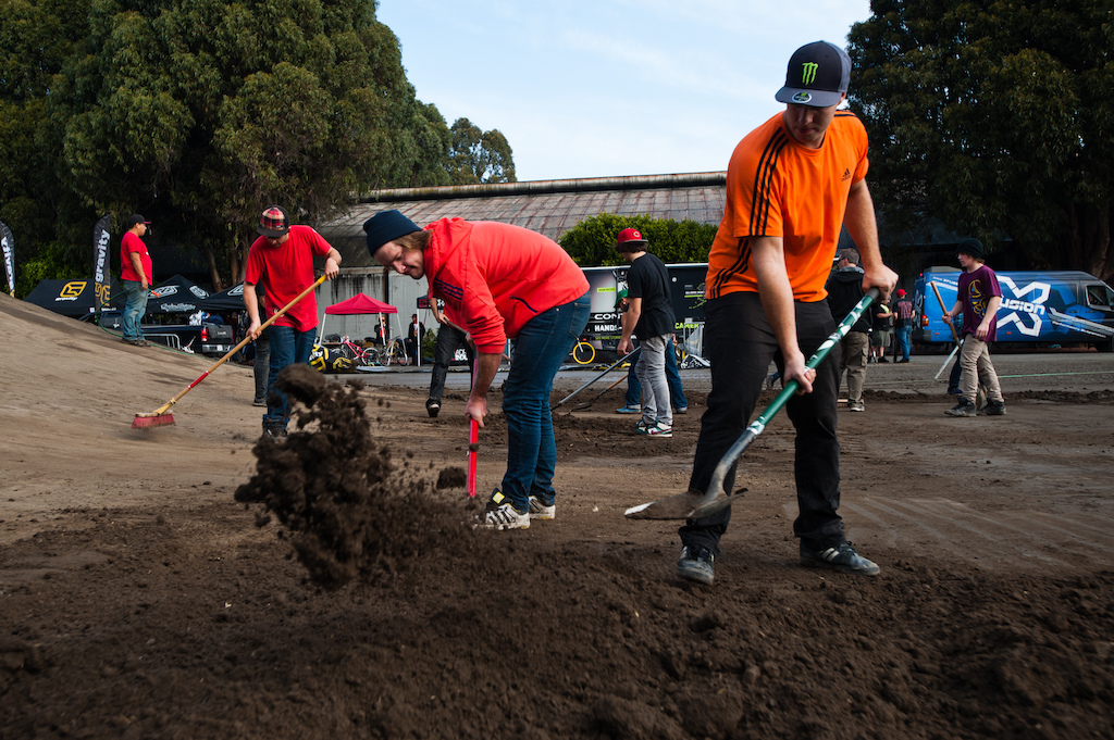 R-Dawg Linus Sjoholm amp Niki Leitner help dial in the course after the first day s heavy rain did some damage.