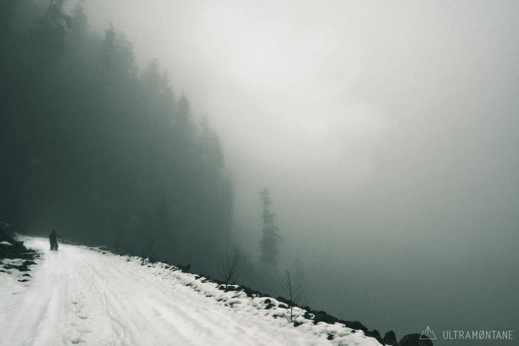 Hiking up the snowy road to where we have been working away on new lines.