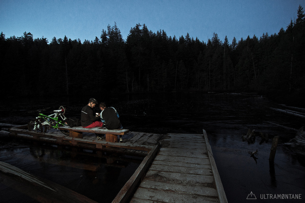 Reviewing footage at the lake after the days pedal.