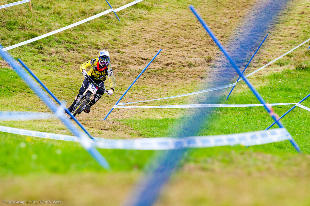 This was one of those moments where everything just lines up right Brook s body lean the course poles and tape framing the corner... When I got this shot and knew I had a winner.