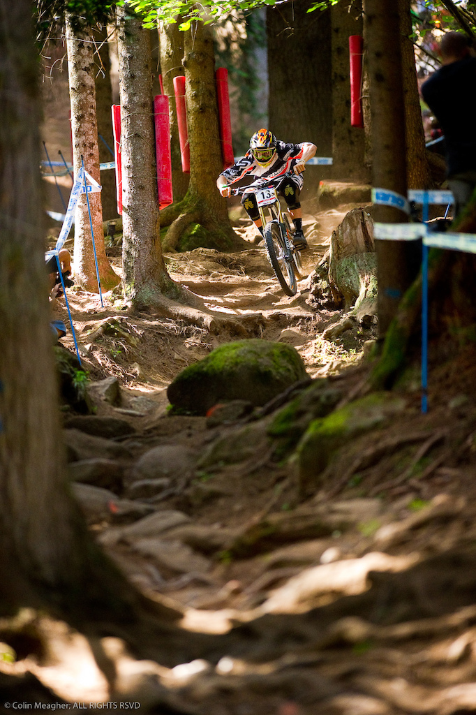 Val di Sole is right up there with Mount St Anne and Ft William when it comes to demanding a complete and focused rider a single mistake at a place like this can have massive consequences. As a photographer the most difficult thing at a place like this is finding a shot that illustrates not only how gnarly the track is but also how graceful and skilled the riders are. This shot of Blenki dancing through this rock and root infested gutter below the main rock garden is one of the few times in 2011 where I feel I truly nailed it.