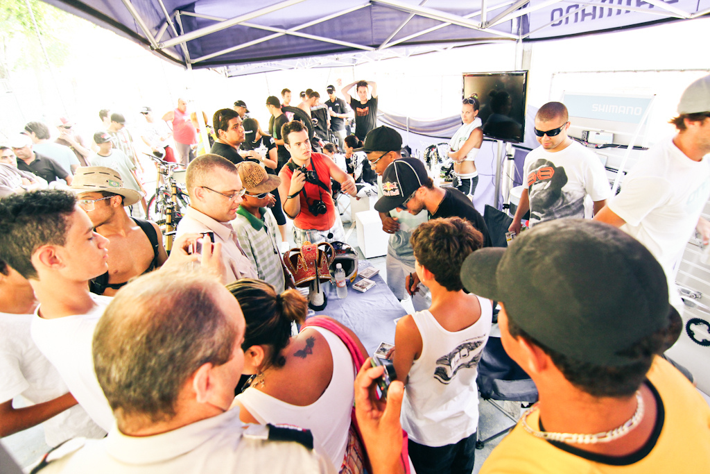 Signing autographs.